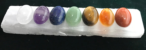 CHAKRA STONES on SELENITE, Chakra cabochons are glued to a Selenite charger.