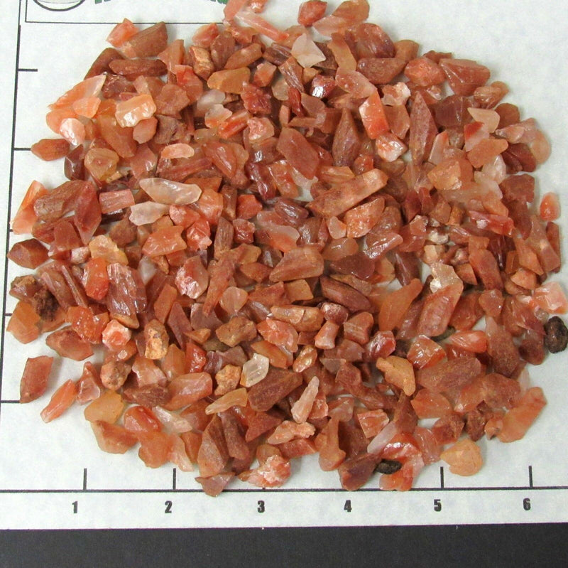 CALCITE CHUNKS RED 1/2-3/4" rough  stones natural brownish-red.    1/2 lb bulk