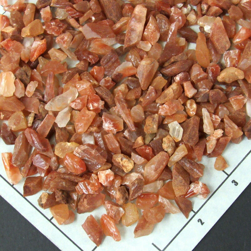 CALCITE CHUNKS RED 1/2-3/4" rough  stones natural brownish-red.    1/2 lb bulk