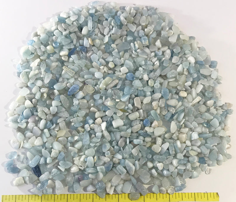 Aquamarine XX-Small (6-8mm) polished light blue stones.  1 lb.