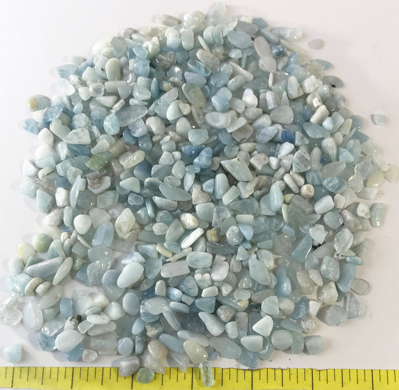 Aquamarine XX-Small (6-8mm) polished light blue stones.  1/2 lb.