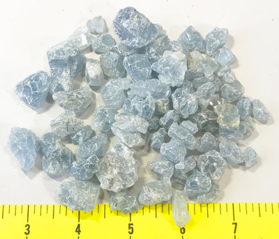 CELESTITE Natural "A" variety of sizes- tiny to small rough crystals.  1/2 lb.